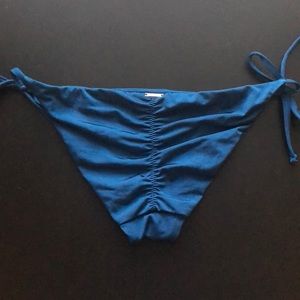 A Che Black cheeky side tie bikini bottoms